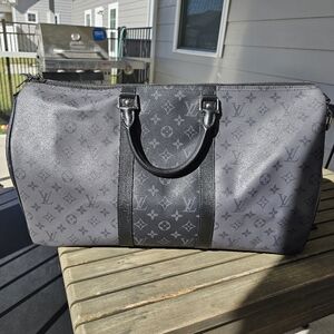 Louis Vuitton Keepall Bandoulière 50 in Monogram Eclipse coated canvas